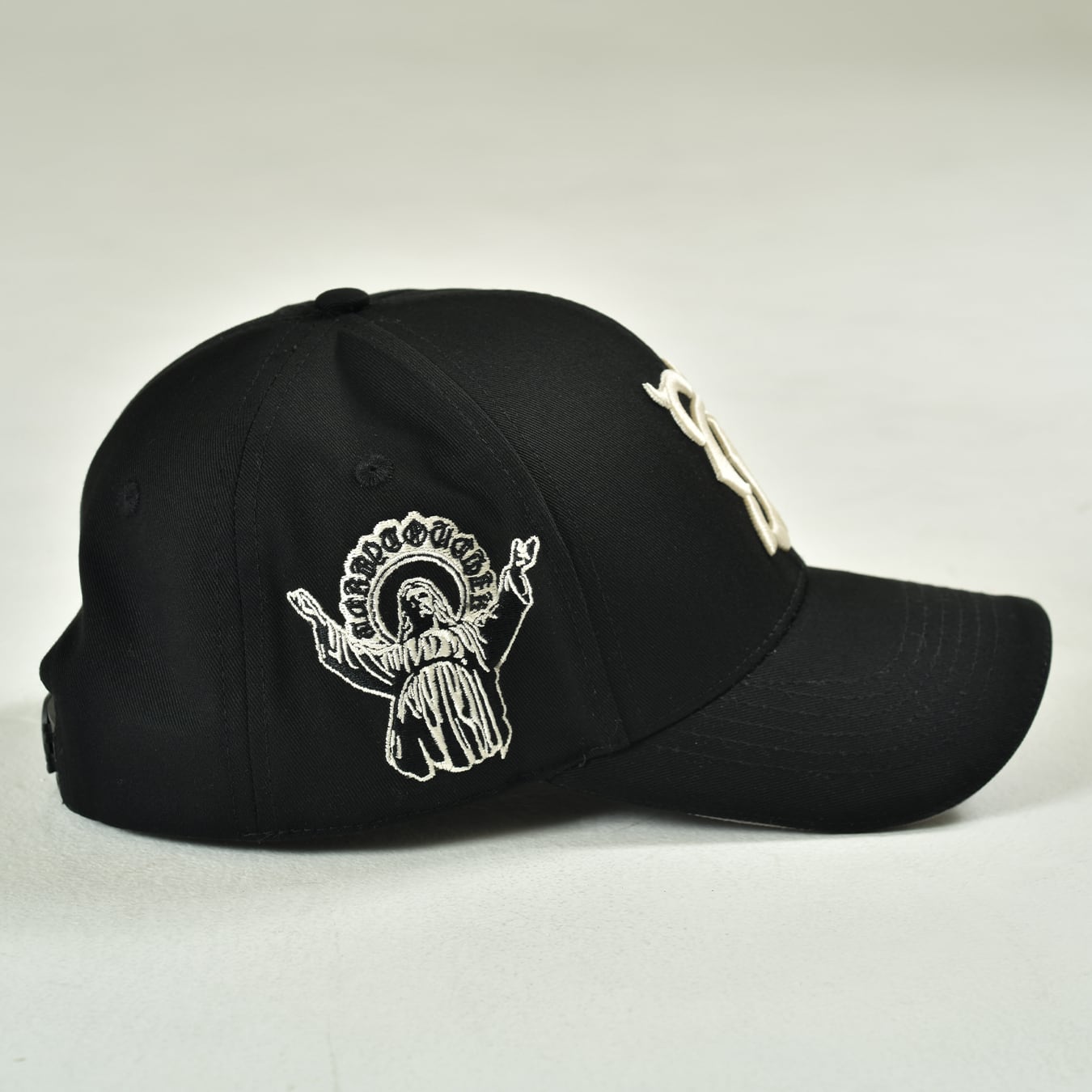 T.C.R MONOGRAM LOGO 6PANEL JESUS CAP - BLACK
