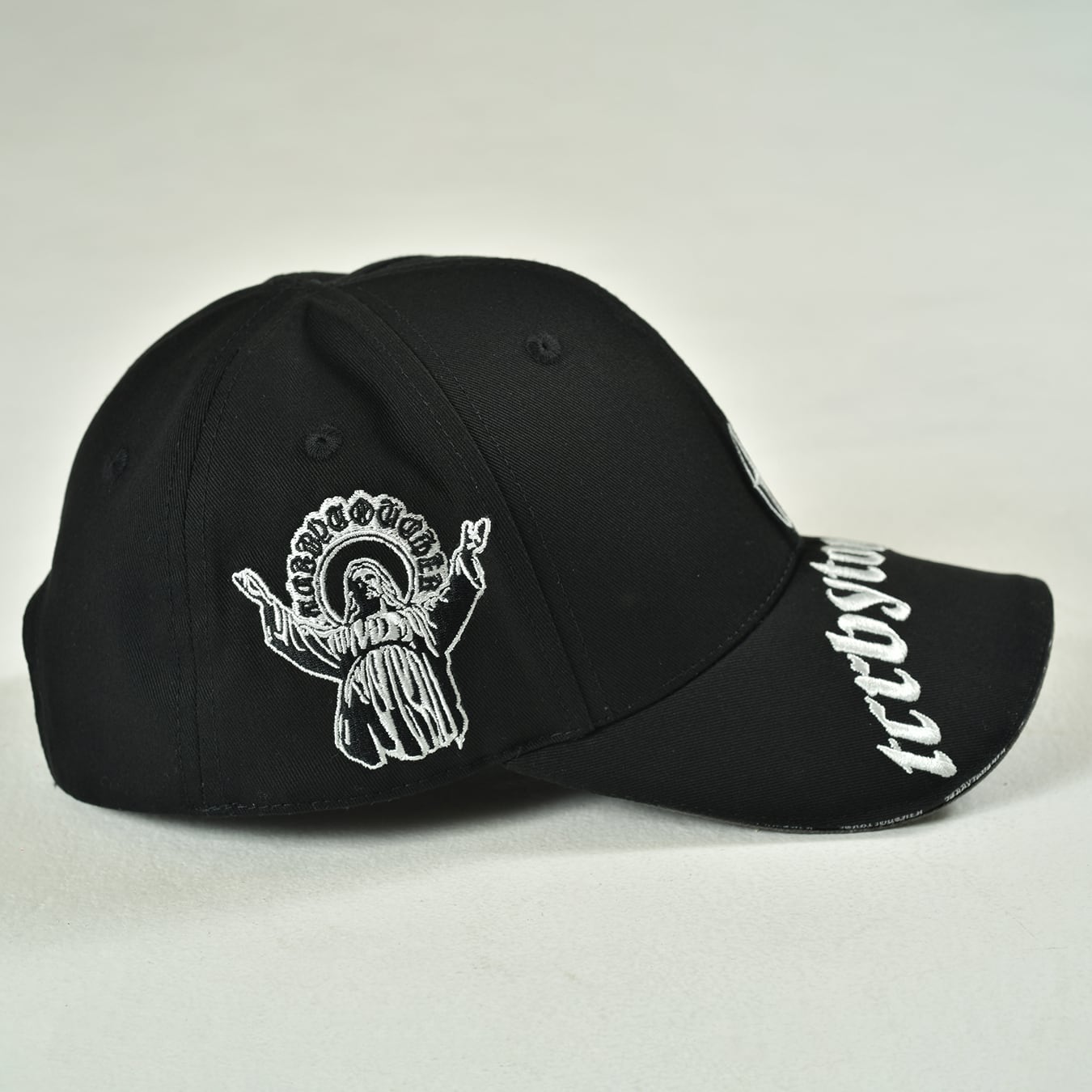 T.C.R VISOR LOGO 6PANEL JESUS CAP - BLACK