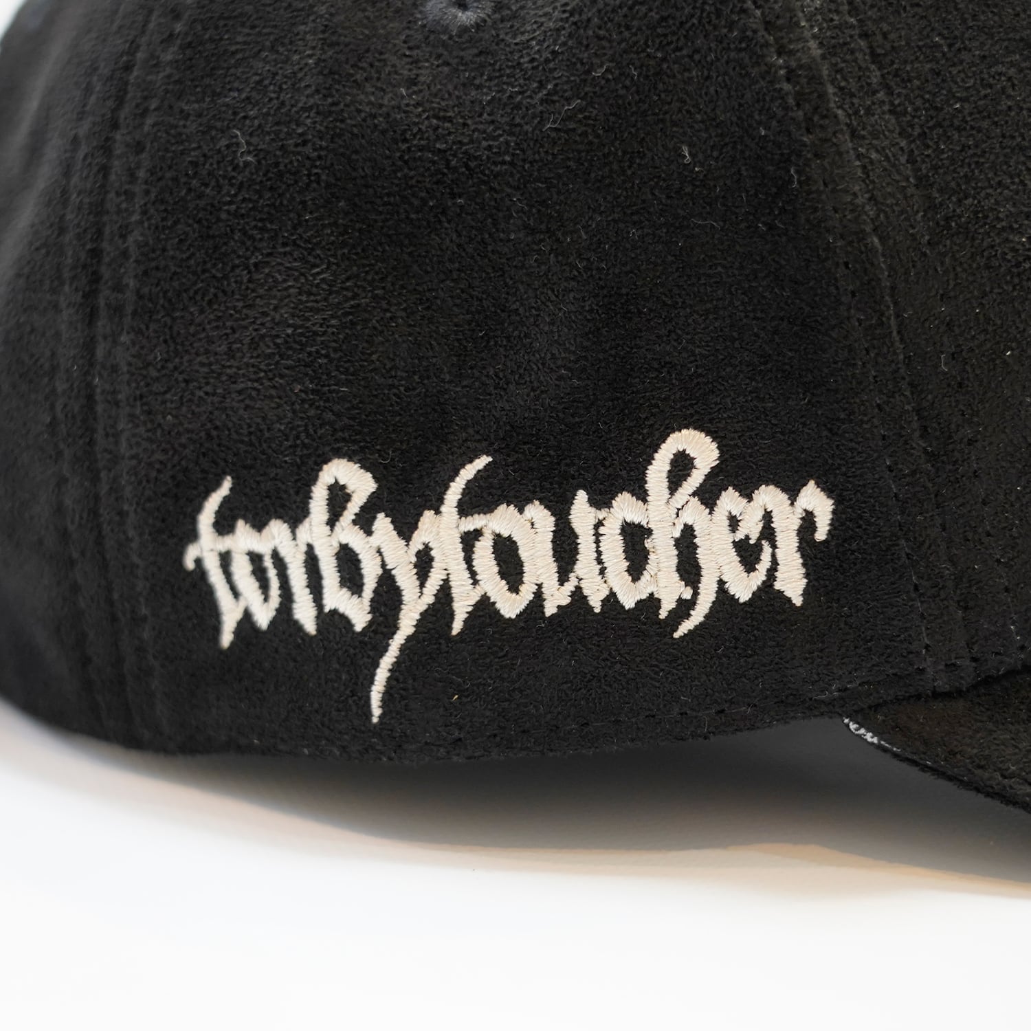 T.C.R LOGO FAUX SUEDE STRAP BACK CAP - BLACK