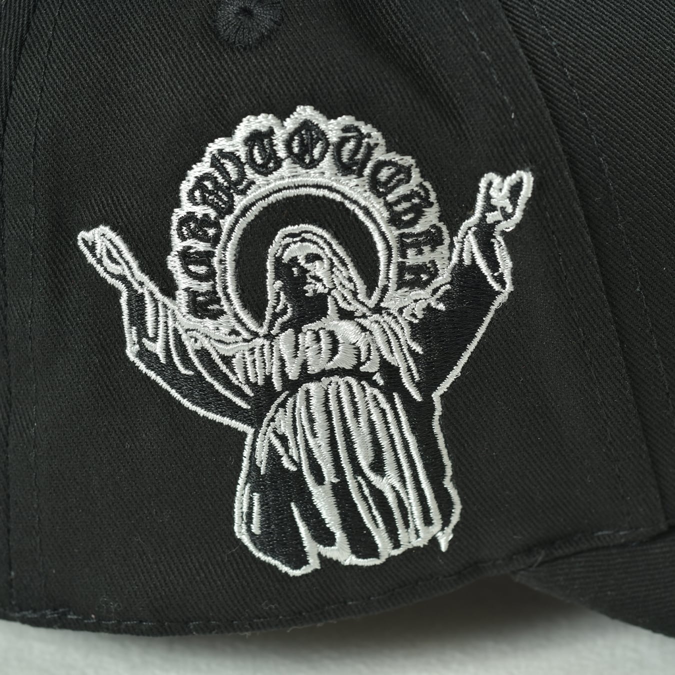 T.C.R VISOR LOGO 6PANEL JESUS CAP - BLACK