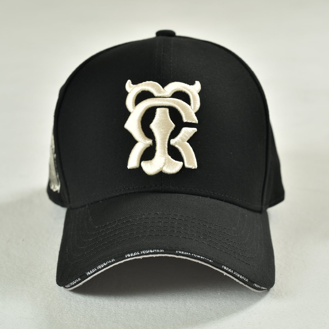 T.C.R MONOGRAM LOGO 6PANEL JESUS CAP - BLACK