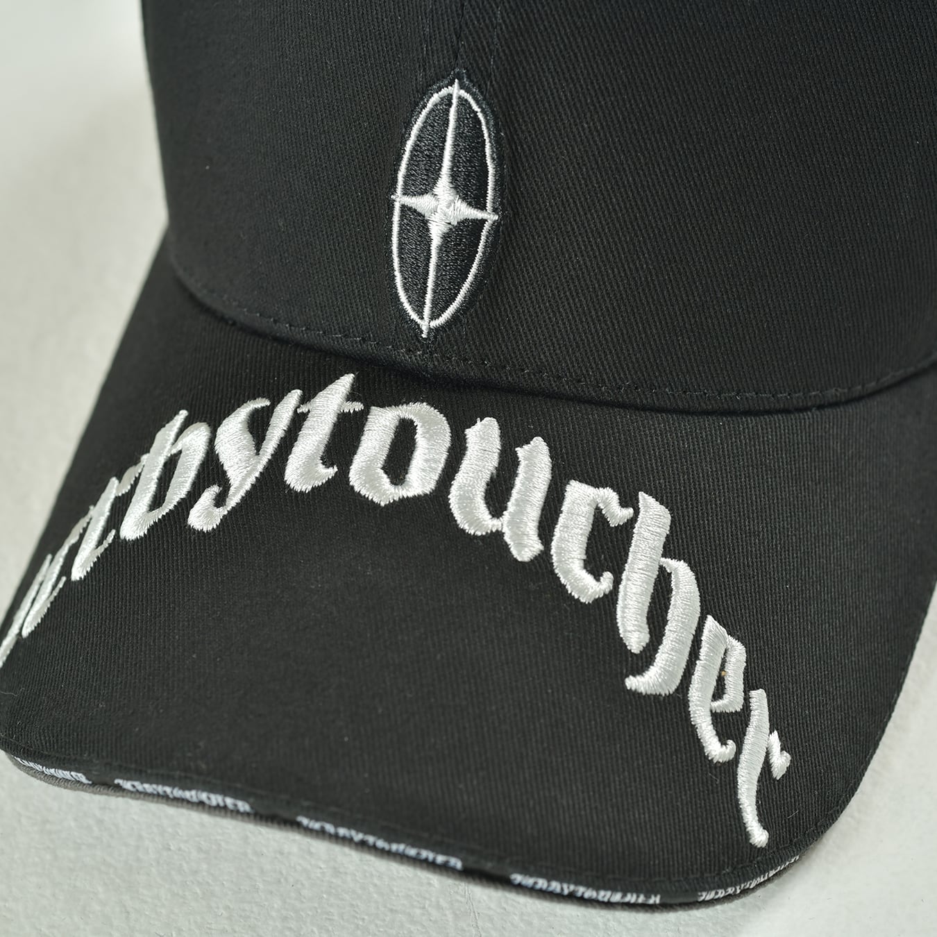 T.C.R VISOR LOGO 6PANEL JESUS CAP - BLACK