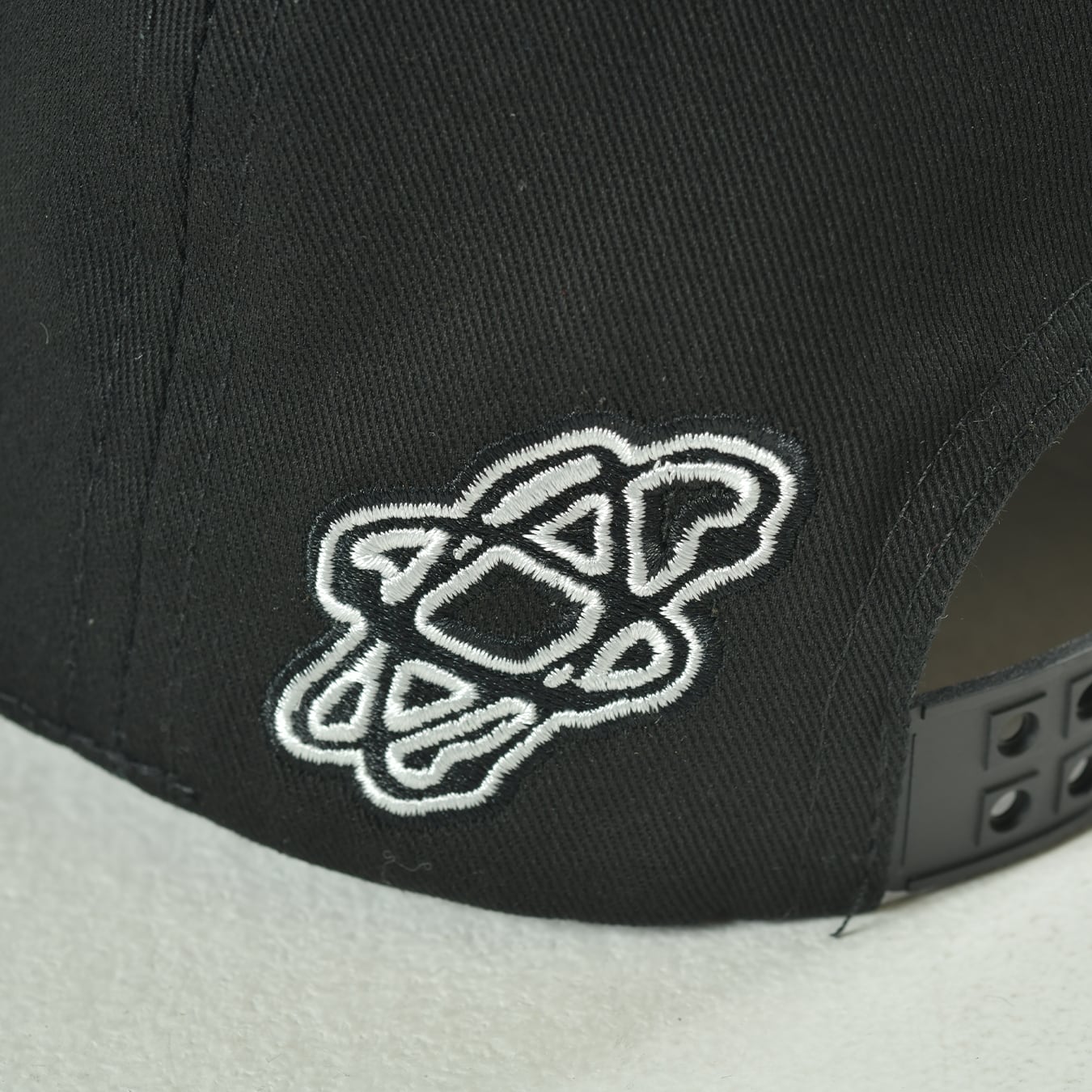 T.C.R VISOR LOGO 6PANEL JESUS CAP - BLACK
