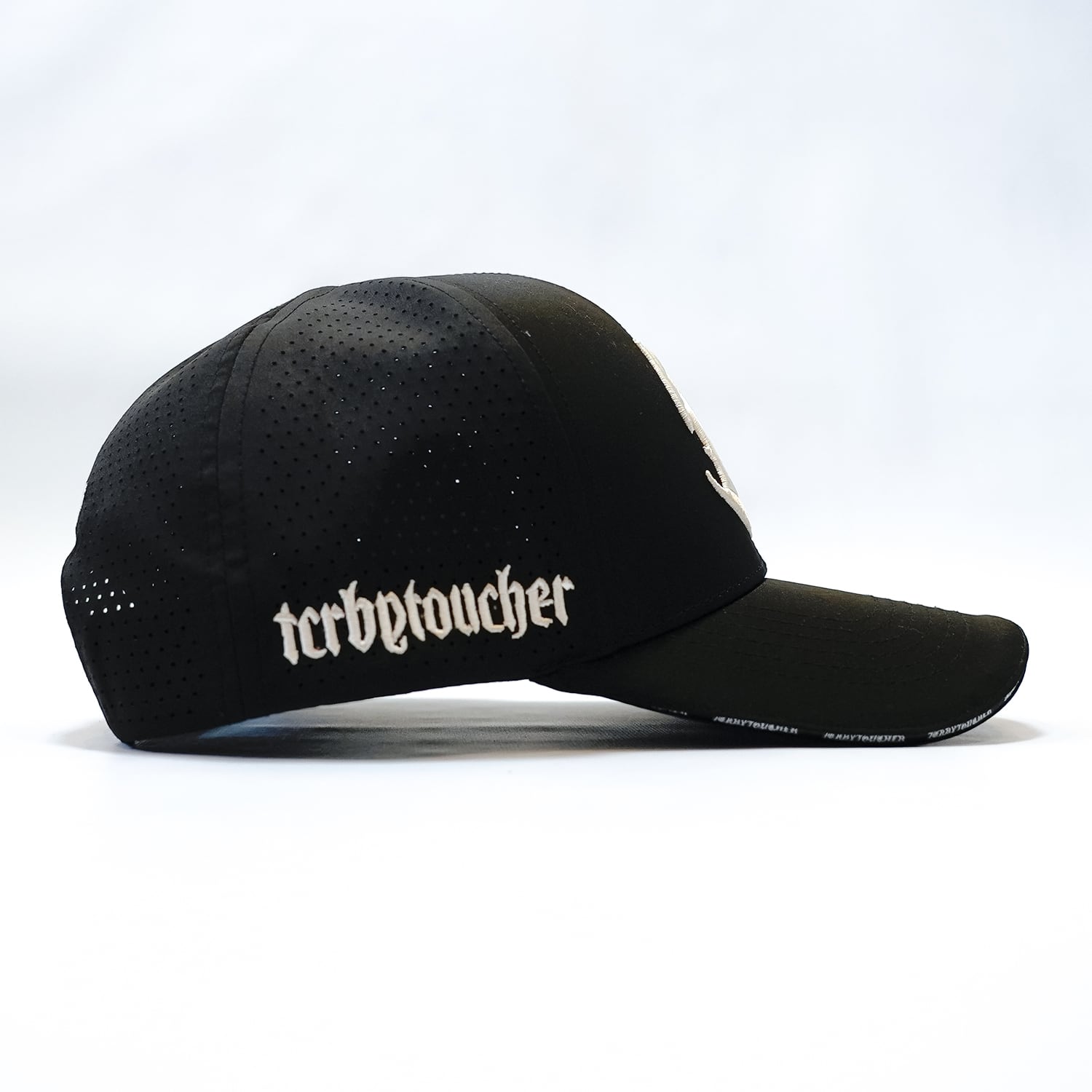 T.C.R NU-YOUTH LASER CUT HOLE QUICK DRY 6PANEL CAP - BLACK
